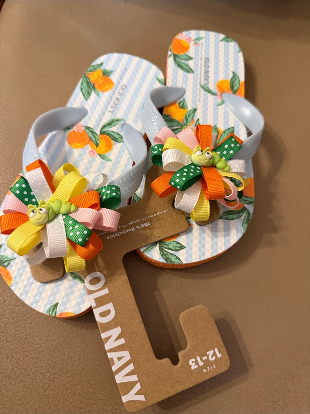 Old Navy Orange Floral Flip Flops with Colorful Ribbon Bow